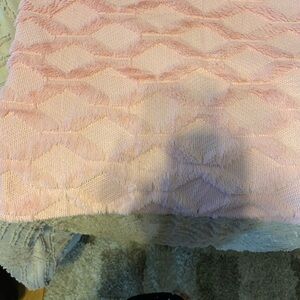 Pink Textured Pillow for Cozy Bedding there is two cases.